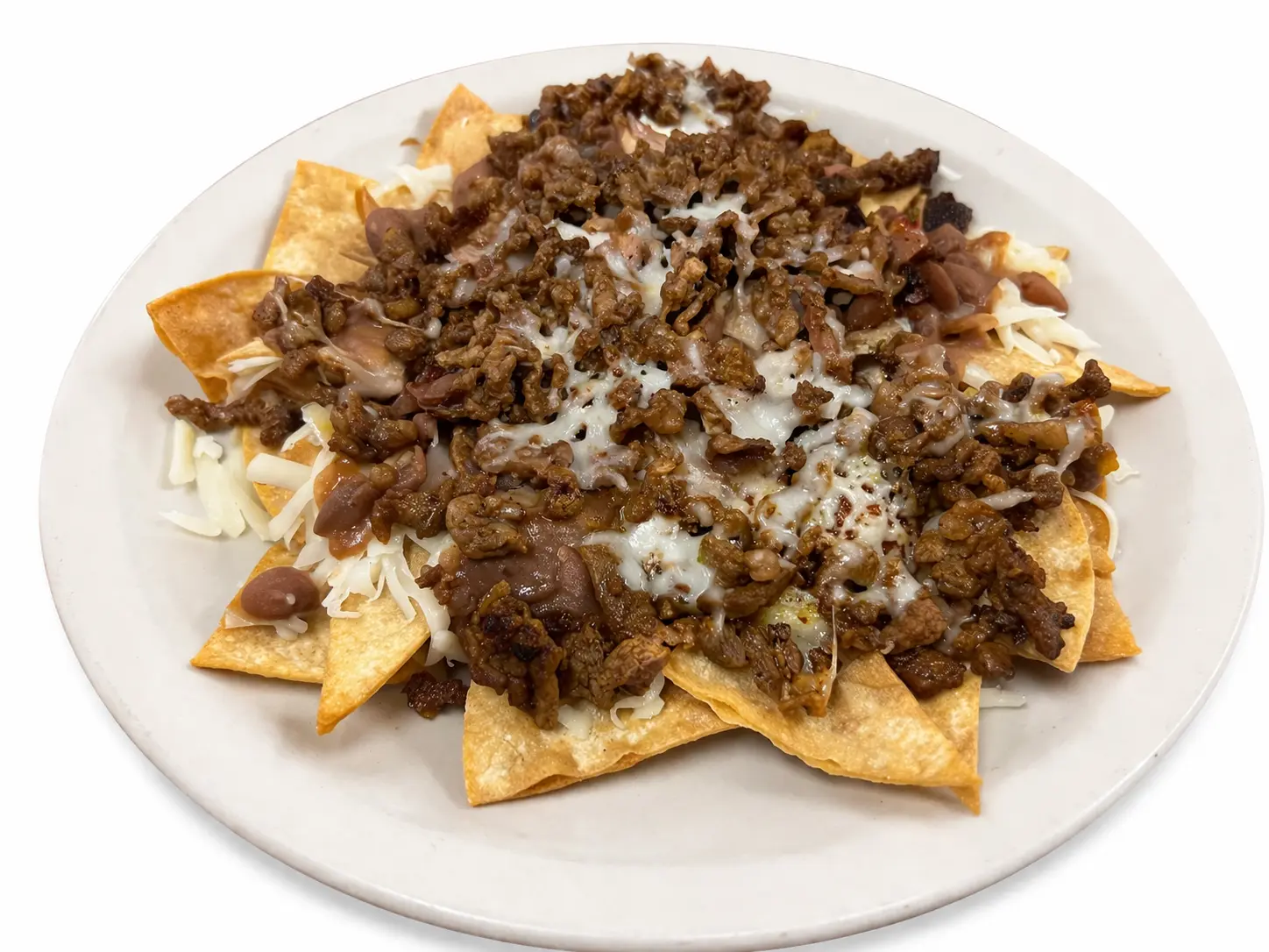 carne asada nachos with cheese and beans on plate in Baldwin Park and East Los Angeles