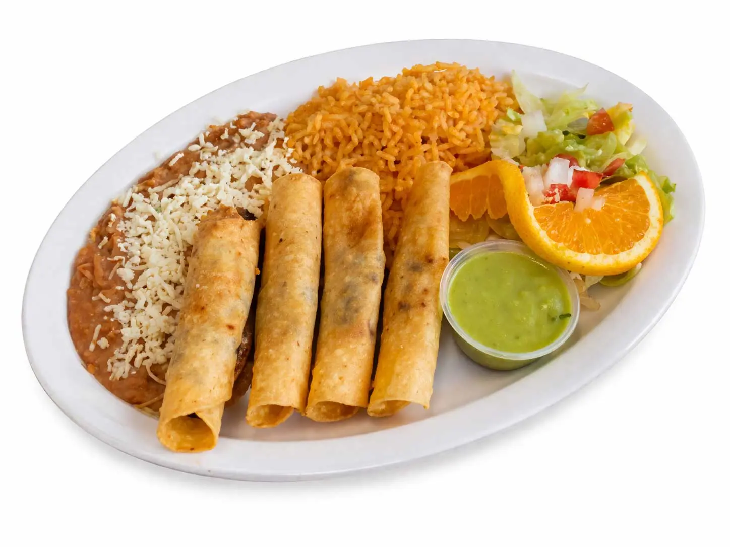 Mexican taquitos plate with rice, beans, salad and green salsa on white plate